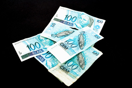 Few of Brazilian hundred currency on Black backgroundの写真素材