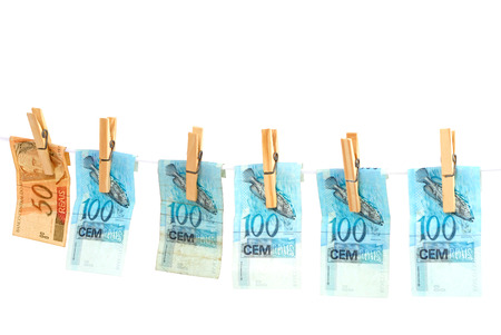 Drying money after washing. Brazilian Real.の写真素材