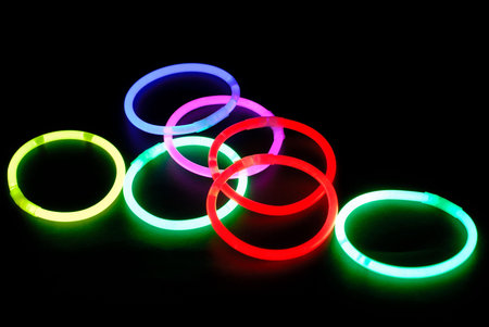 Colorful Neon lights on black background .