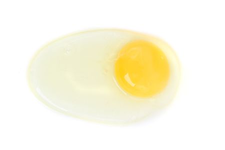 Raw Egg outside the cracked sheel .の写真素材