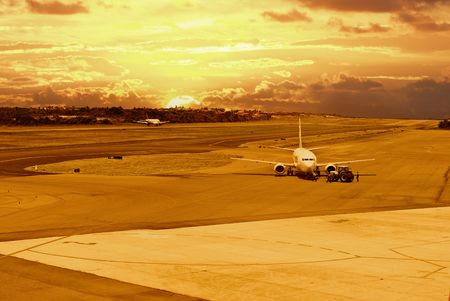 Planes taking off and landing at airport runway.の写真素材