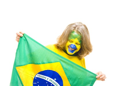 Brazilian sport fan holding a Brazilian Flagの写真素材
