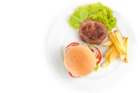 Delicious Bread with vegetables, fries, and meat .の写真素材