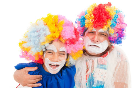 One child clown smile and an adult clown crying