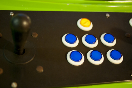 Old fliperrama panel vintage video game buttons .の写真素材
