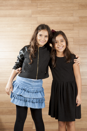 Young children friends, indoor photo .の写真素材