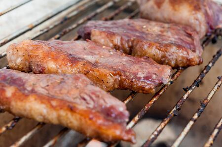 Brazilian Picanha meat barbecue on charcoal fire.の写真素材