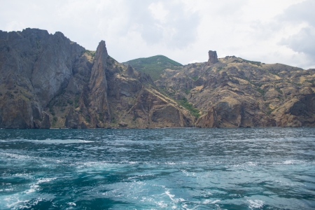 The view on Karadag rock  reserve on place of ancient extinct volcano  from the side of a excursion ship  Ð¡rimea, Ukraine の写真素材