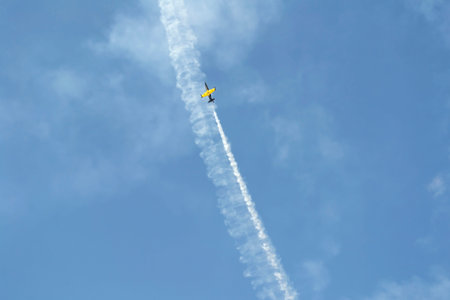 Russian military airplane is flying away in blue sky