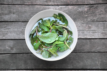 mint in dish full of water