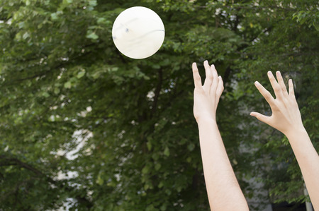 Detail of playing volleyballの写真素材