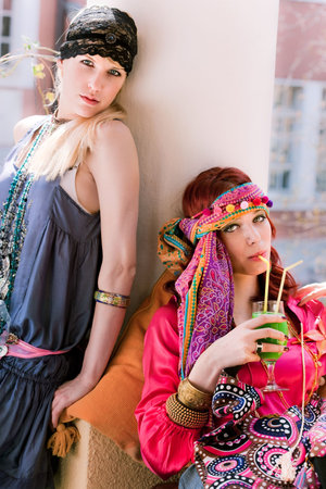 two woman in fashionable clothesの写真素材
