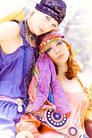 couple of girlfriends in colorful clothes enjoy in summer dayの写真素材