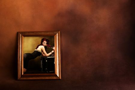 attractive red hair woman in frameの写真素材