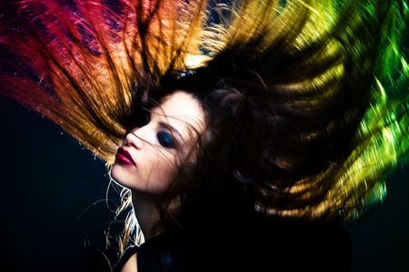 woman with hair in motion, studio shotの写真素材