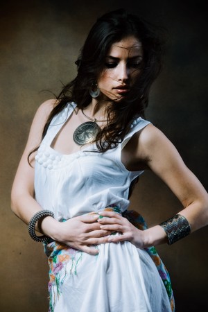 young woman dancing, studio shotの写真素材