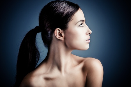 natural young woman beauty portrait, profile, studio shotの写真素材