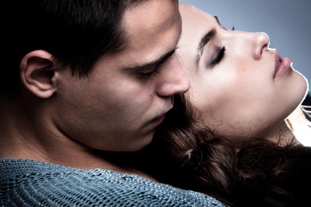 young couple in love portrait, close up, studio shotの写真素材