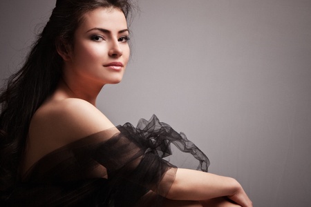 lovely sensual young woman portrait small amount of grain addedの写真素材