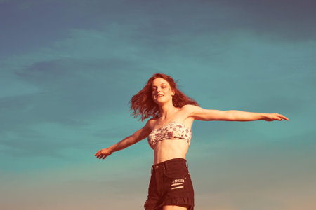 girl enjoy in summer day sky background