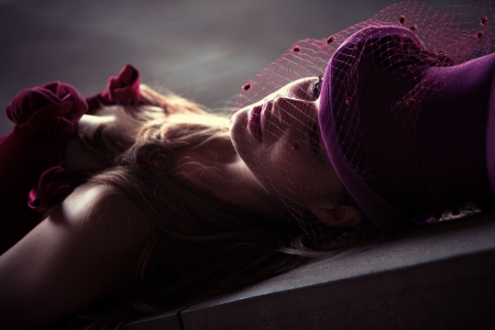 young elegant woman wearing mesh hat outdoor shot の写真素材
