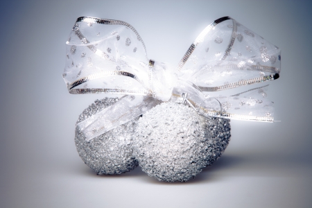 silver christmas decoration on gray  backgroundの写真素材