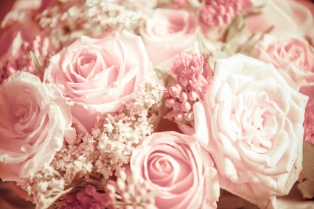 bouquet of  beautiful pink and white roses with small decorative flowers closeupの写真素材