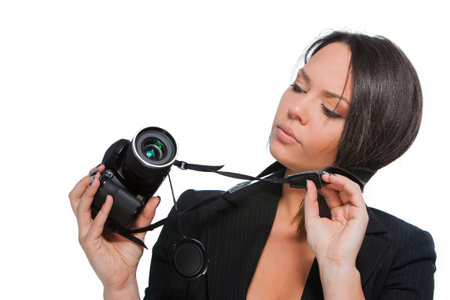 young photographer looking at camera