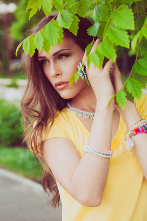 young urban woman portrait in park city summer dayの写真素材