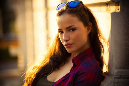 casual urban girl portrait outdoor in the city summer dayの写真素材