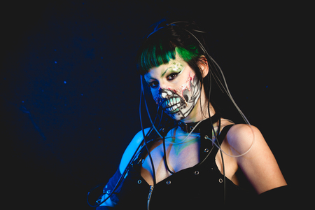 scary cyber skeleton woman studio shotの写真素材