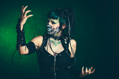 scary cyber skeleton woman studio shotの写真素材