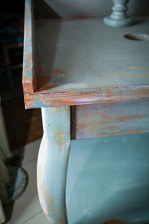 part of  wooden desk painted with chalky paint diy ideas closeupの写真素材