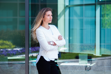 portrait of young  blonde business woman outdoor in the cityの写真素材