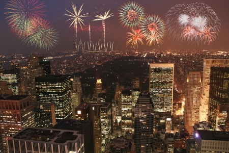 Manhattan at night with fireworksの写真素材