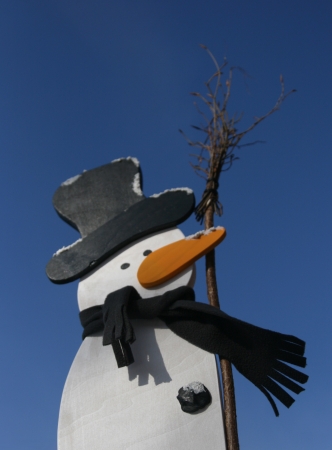 Snowmanscene in the blue skyの写真素材