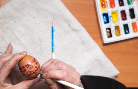 Preparation for Easter, painting eggs with paintsの写真素材