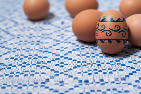 Colorful eggs on blue white towel. Easter backgroundの写真素材