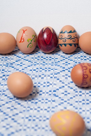 Colorful eggs on blue white towel. Easter backgroundの写真素材