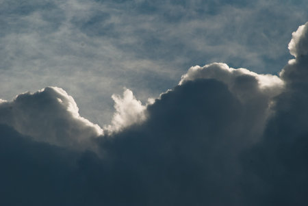 sun breaking through a cluster of Cumulus clouds