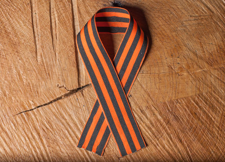 Victory day: St. George ribbon on wooden background