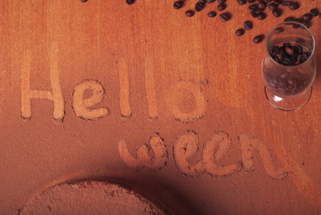 cake sprinkle with cocoa powder, the inscription Halloween on the table, Happy Halloween