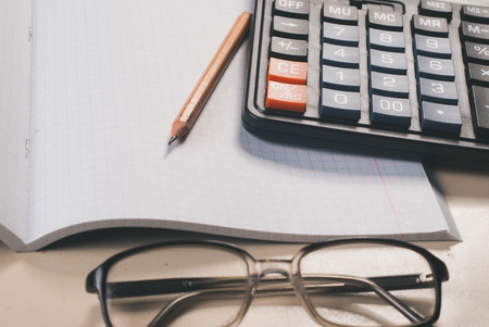 calculator, Notepad and pencil, business still life Deskの写真素材