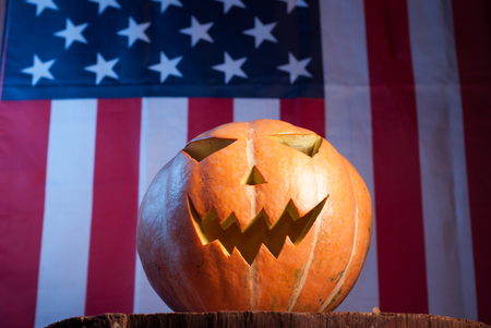 Jack-o '- lantern on an American flag background, happy holidays, Jack-o ' - lantern-patriotの写真素材