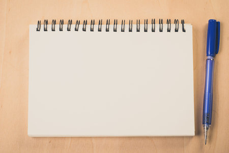 blank pages white paper notebook at office Desk , business background, concept for educationの写真素材