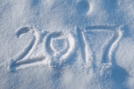 2017 new year's greetings, footprints in the snow, New year 2017, the numbers on the snowの写真素材