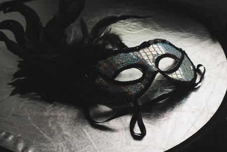 Black carnival mask with feathers, Mardi Gras, Venetian ball