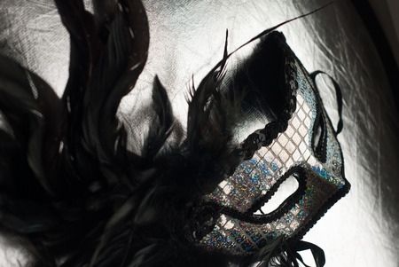 Black carnival mask with feathers, Mardi Gras, Venetian ballの写真素材