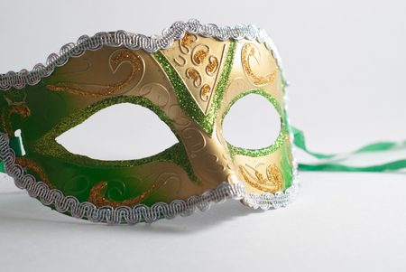 yellow and green Venetian mask on white background, concept of carnival, Gras Mardiの写真素材