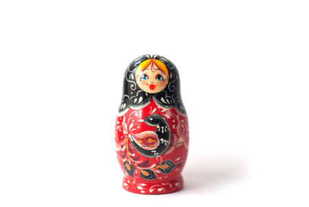 Russian doll isolated on white background, hand-painted, traditional souvenirの写真素材